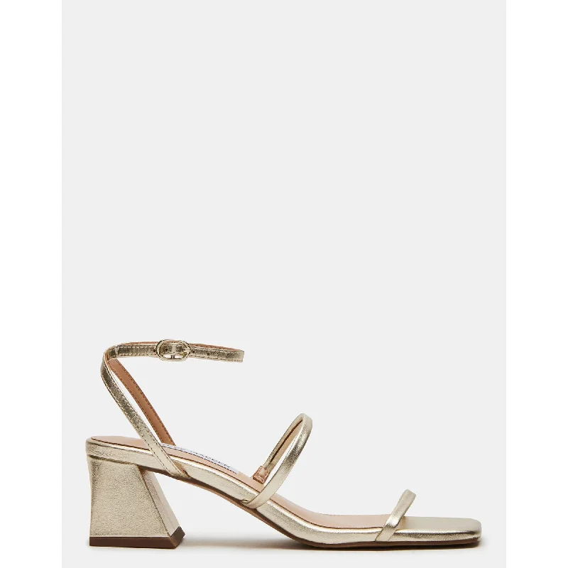 Heeled sandals with earthy tonesAshlynn Gold Leather